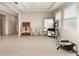 Open living room with tile floors and lots of natural light at 12436 Shining Willow St, Riverview, FL 33579