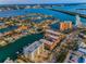 Panoramic aerial view of waterfront condos with beautiful community and water access at 125 Island Way # 502, Clearwater Beach, FL 33767