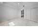 This bedroom features tile floors, a ceiling fan and closet with sliding doors at 125 Island Way # 502, Clearwater Beach, FL 33767
