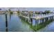 Scenic boat dock with ample mooring, canal access, and boat lift at 125 Island Way # 502, Clearwater Beach, FL 33767
