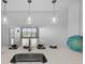 View from the kitchen of an open living space with natural light and modern fixtures at 125 Island Way # 502, Clearwater Beach, FL 33767