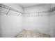 This walk in closet features wire shelving and tile floors at 125 Island Way # 502, Clearwater Beach, FL 33767