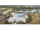 Aerial shot of the community center, pool and playground near the lake at 12710 Wheatgrass Ct, Parrish, FL 34219