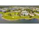 Aerial view of the community recreation area, pool, park and pond at 12710 Wheatgrass Ct, Parrish, FL 34219