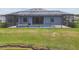 Spacious backyard with screened-in pool and spa, offering a private retreat at 12710 Wheatgrass Ct, Parrish, FL 34219