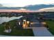 Beautiful exterior view of the house, showcasing its well-kept lawn, landscape, and three car garage at 12710 Wheatgrass Ct, Parrish, FL 34219
