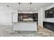 Modern kitchen featuring an island with pendant lights and stainless steel appliances at 12710 Wheatgrass Ct, Parrish, FL 34219