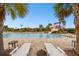 Resort style pool with beach chairs and water slide at 12710 Wheatgrass Ct, Parrish, FL 34219