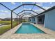 Screened pool and patio area with brick pavers; great for relaxing or entertaining outdoors at 12710 Wheatgrass Ct, Parrish, FL 34219