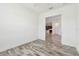 Room featuring stylish tile floors with access to the kitchen through an open doorway at 12710 Wheatgrass Ct, Parrish, FL 34219