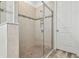 Elegant walk-in shower with stylish tile surround and modern fixtures at 12710 Wheatgrass Ct, Parrish, FL 34219