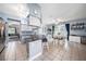 Modern kitchen featuring an island, stainless steel appliances, and an open layout to the dining area at 1313 Key West Ct, Wesley Chapel, FL 33544