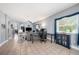 Open-concept living space offering tiled flooring and neutral walls, perfect for modern living and entertaining at 1313 Key West Ct, Wesley Chapel, FL 33544
