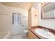 Bathroom featuring wainscotting, a sink with a vanity, and a toilet at 16201 Country Crossing Dr, Tampa, FL 33624