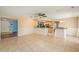 Open concept dining area featuring tile floors, eat-in kitchen and views to the lanai at 16201 Country Crossing Dr, Tampa, FL 33624