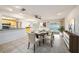 Bright dining area with tile floors, pool view, and modern decor at 16201 Country Crossing Dr, Tampa, FL 33624