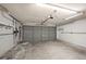 The garage is spacious, with concrete floors and an automatic door opener at 16201 Country Crossing Dr, Tampa, FL 33624