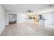 Spacious kitchen with tile flooring leading to the front door at 16201 Country Crossing Dr, Tampa, FL 33624