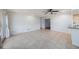 Neutral living room with tile floors, white wainscoting, and slider to the pool at 16201 Country Crossing Dr, Tampa, FL 33624