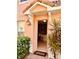 Welcoming front entrance featuring tiled floors, a view into the interior, and side windows at 184 Banyan Bay Dr, St Petersburg, FL 33705