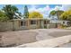 Charming single-story home with a cozy front yard and a well-maintained exterior at 1858 Oregon Ave Ne, St Petersburg, FL 33703