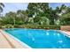 A refreshing pool area with clear, blue water, perfect for relaxation and enjoying sunny days at 1864 Clearbrooke Dr, Clearwater, FL 33760