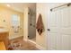 Bright bathroom featuring a walk-in shower with glass door and tiled surround at 1891 Harmony Dr, Clearwater, FL 33756