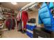 Spacious walk-in closet, with ample shelving and storage for clothes and accessories at 1891 Harmony Dr, Clearwater, FL 33756