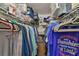 Organized closet with shelving and hanging racks, offering ample storage space for clothes and accessories at 1902 Hanson Ct # 308, Sun City Center, FL 33573