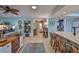 Open-concept living space seamlessly connects the living room and kitchen at 1902 Hanson Ct # 308, Sun City Center, FL 33573
