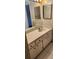 Bathroom featuring a vanity with neutral countertops and cabinets at 2017 Skimmer W Ct # 413, Clearwater, FL 33762