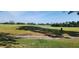 Community view of golf course with lake at 2017 Skimmer W Ct # 413, Clearwater, FL 33762