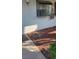Exterior shot featuring a window and landscaping around the building at 2017 Skimmer W Ct # 413, Clearwater, FL 33762