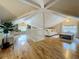 Spacious attic featuring high ceilings, hardwood floors, and a cozy seating area with large windows at 231 15Th Ne Ave, St Petersburg, FL 33704