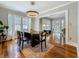 Bright dining area showcasing an elegant dining set and windows for natural light at 231 15Th Ne Ave, St Petersburg, FL 33704