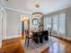 Dining room featuring an oval table, modern light fixture, and view into kitchen at 231 15Th Ne Ave, St Petersburg, FL 33704