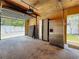 Well-lit garage with stainless steel refrigerators and easy access to the outdoors at 231 15Th Ne Ave, St Petersburg, FL 33704