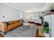 Elegant living room with hardwood floors, stylish sofas, and a decorative fireplace at 231 15Th Ne Ave, St Petersburg, FL 33704