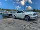 Truck towing a boat at a boat ramp, offering convenient access to the water for boating and recreational activities at 2349 Wood Pointe Dr, Holiday, FL 34691