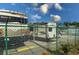 Secure storage area with RV and camper spots at 2349 Wood Pointe Dr, Holiday, FL 34691