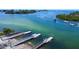 Picturesque waterfront community offering boat docks and clear, aqua-colored water at 2349 Wood Pointe Dr, Holiday, FL 34691