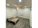Bright bedroom with ceiling fan, window, and neutral wall color at 2390 Bentley Dr, Palm Harbor, FL 34684