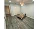Bedroom featuring a ceiling fan, closet and neutral color scheme at 2390 Bentley Dr, Palm Harbor, FL 34684