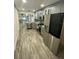 Modern kitchen featuring granite countertops, stainless appliances, and an open layout at 2390 Bentley Dr, Palm Harbor, FL 34684