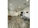 Open living area featuring recessed lighting and wood-look flooring at 2390 Bentley Dr, Palm Harbor, FL 34684