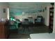 Cozy sitting area decorated with nautical-themed wall art and comfortable seating at 2980 Haines Bayshore Rd # 124, Clearwater, FL 33760
