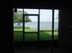 View from the lanai featuring bridge and bay at 2980 Haines Bayshore Rd # 124, Clearwater, FL 33760