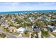 Coastal neighborhood aerial view showcasing the home's location and proximity to the water at 306 12Th Ave, Indian Rocks Beach, FL 33785