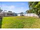 Expansive backyard with a shed and lots of green space at 306 12Th Ave, Indian Rocks Beach, FL 33785
