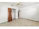 Bedroom featuring tile floors, a closet and a ceiling fan at 306 12Th Ave, Indian Rocks Beach, FL 33785